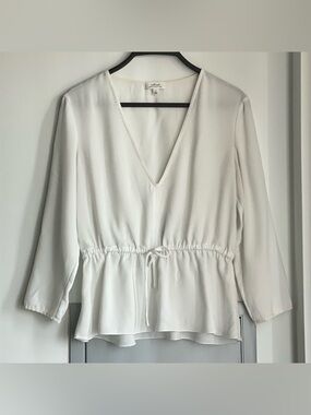 ARITZIA WILFRED Barreme White V-Neck Blouse with Peplum and Tie-Waist